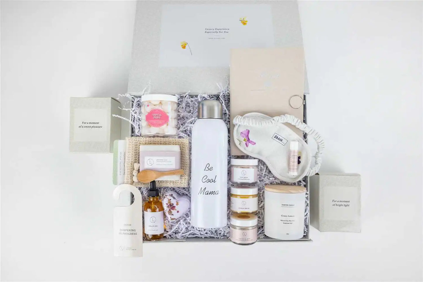 Luxurious natural skincare gift set for new moms. Pampering body care products with organic ingredients. Perfect baby shower or postpartum gift.


