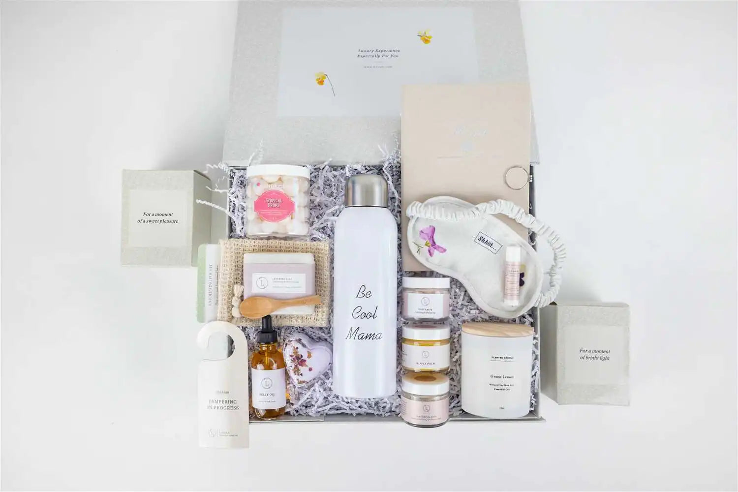 Luxurious natural skincare gift set for new moms. Pampering body care products with organic ingredients. Perfect baby shower or postpartum gift.

