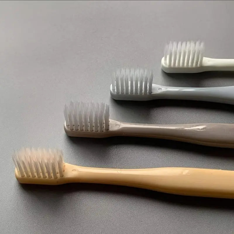 Premium soft-bristled manual toothbrush set with 4 pieces. Gentle on gums, effective cleaning. Perfect for adults with sensitive teeth and gums.

